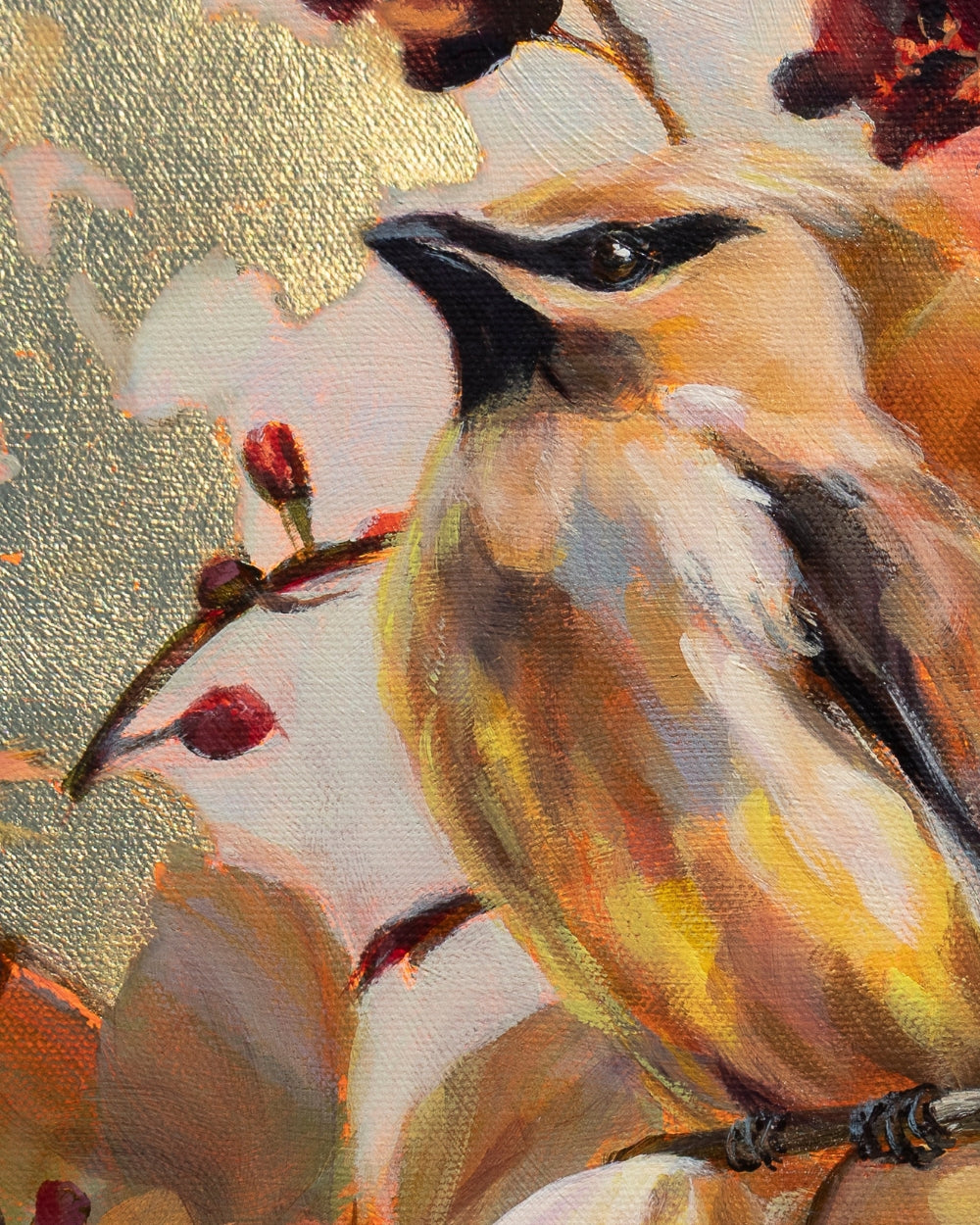 Close-up oil painting of a cedar waxwing bird in warm gold, cream, brown, black, and red tones, perched on a branch with blossoms, from the painting A Passing Fancy by Alexiss Malolo.
